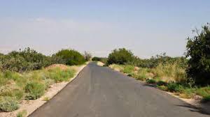 بازگشایی مسیر ساخت جاده بین مزارع در شهرستان رودان